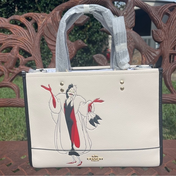 Coach Handbags - NWT Disney X Coach Leather Dempsey Carryall With Cruella Motif In Chalk/…